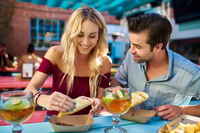 a couple having a date and having dinner together