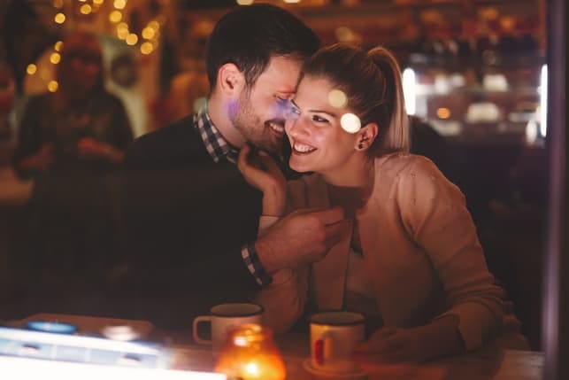 a beautiful couple on a date in a restaurant