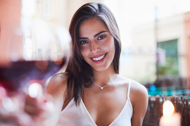 a portrait of an attractive woman smiling