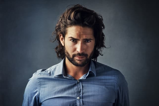 a portrait of a handsome Turkish man