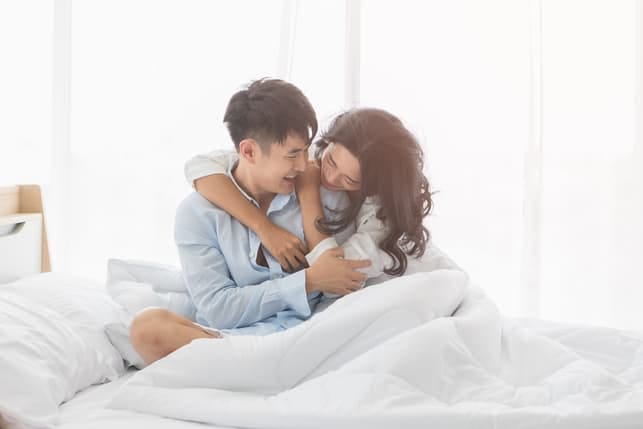 a happy Asian couple
